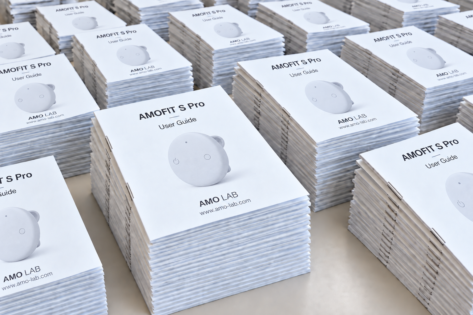 Stacks of AMOFIT S Pro user guides